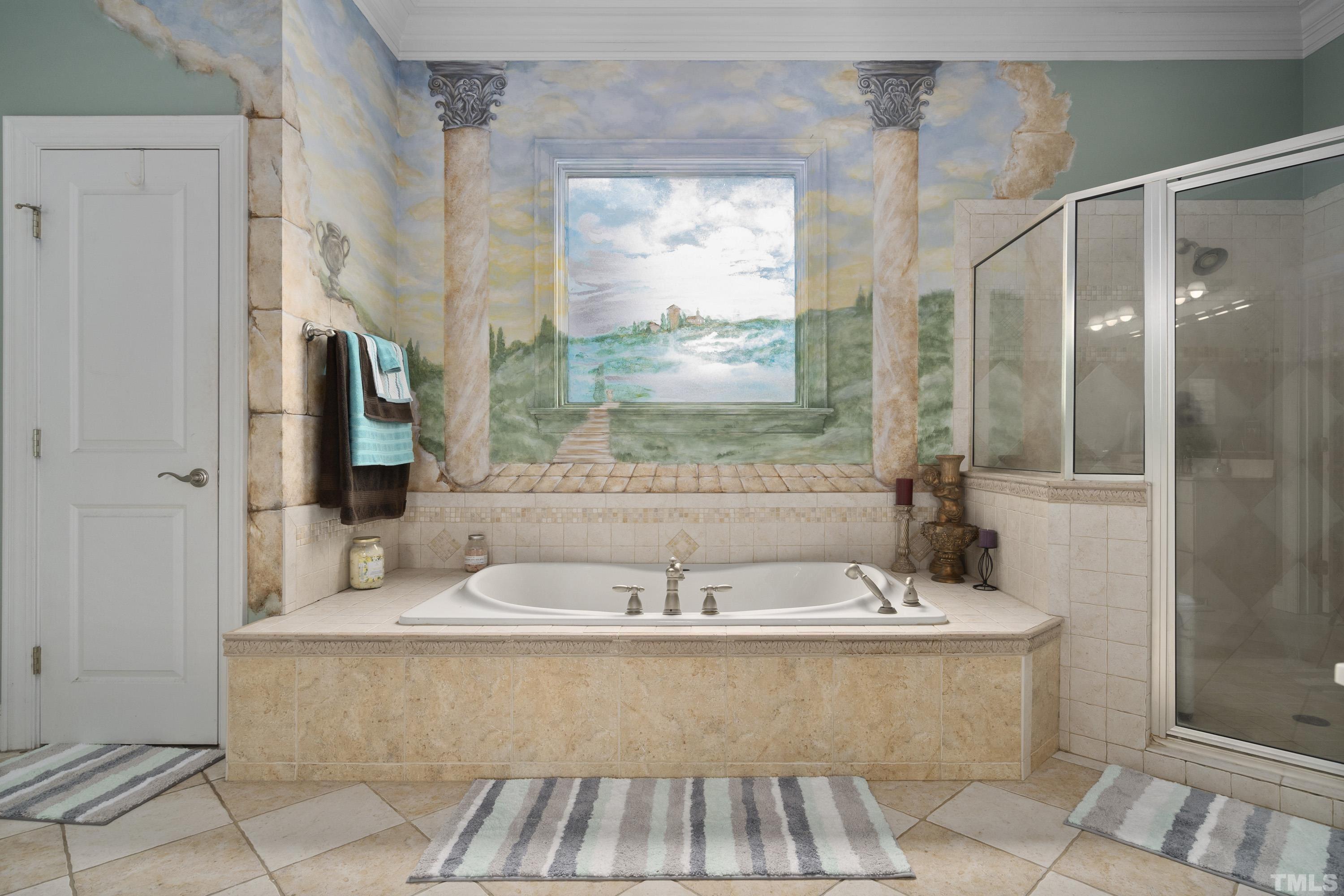 1016 Moss Road Zebulon, NC 27597 - Photo 10 of 30 a bathroom with a bathtub and a sink