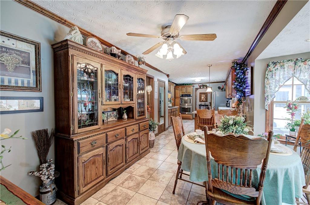 3637 Nebo Road Hiram, GA 30141 - Photo 25 of 63 a view of a dining room with furniture window and wooden floor