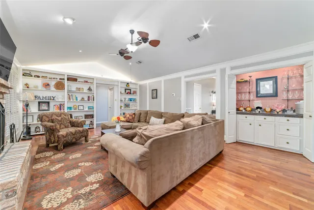 a bedroom with a bed and dresser