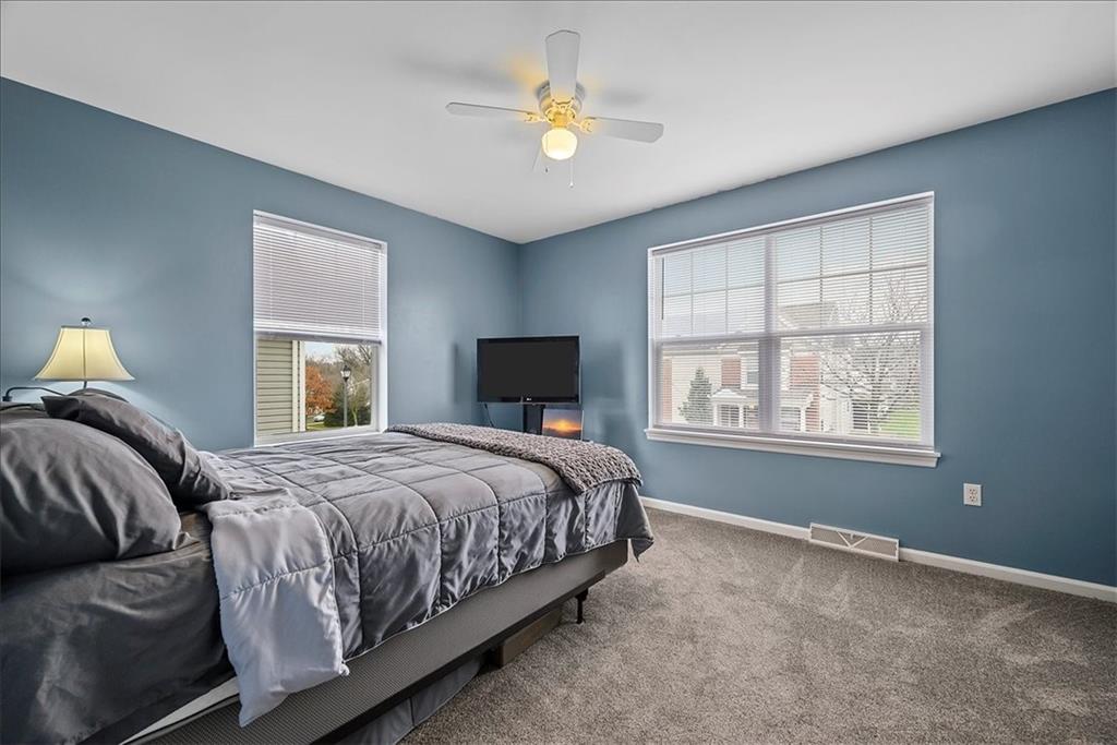 204 Pleasant Ridge Road McKees Rocks, PA 15136 - Photo 14 of 23 a bedroom with a bed and a window
