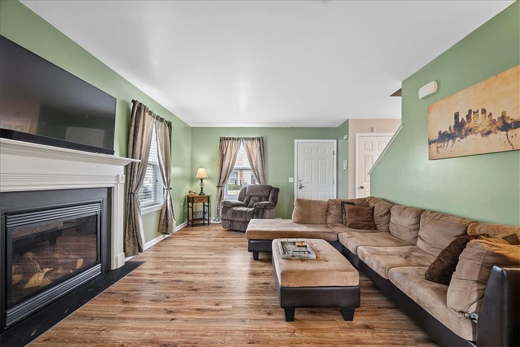 204 Pleasant Ridge Road McKees Rocks, PA 15136 - Photo 5 of 23 a living room with furniture and a fireplace