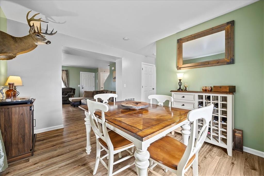 204 Pleasant Ridge Road McKees Rocks, PA 15136 - Photo 8 of 23 a view of a dining room with furniture and wooden floor