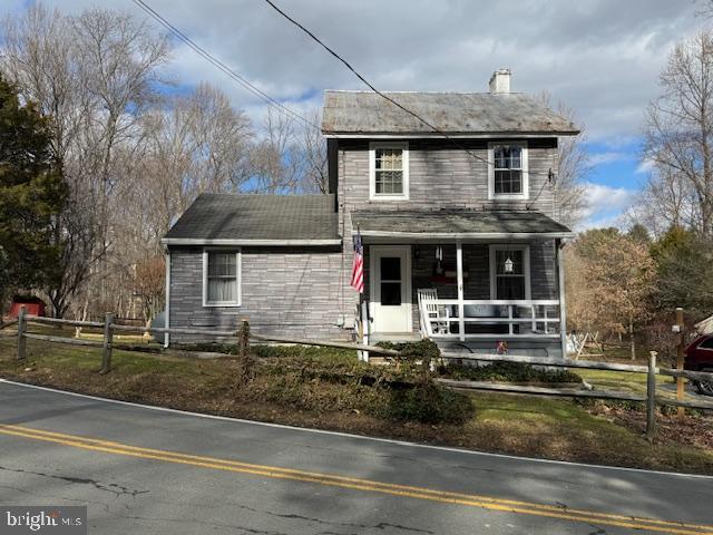 631 McCauley Road Conowingo, MD 21918 - Photo 3 of 32 a front view of a house with a yard