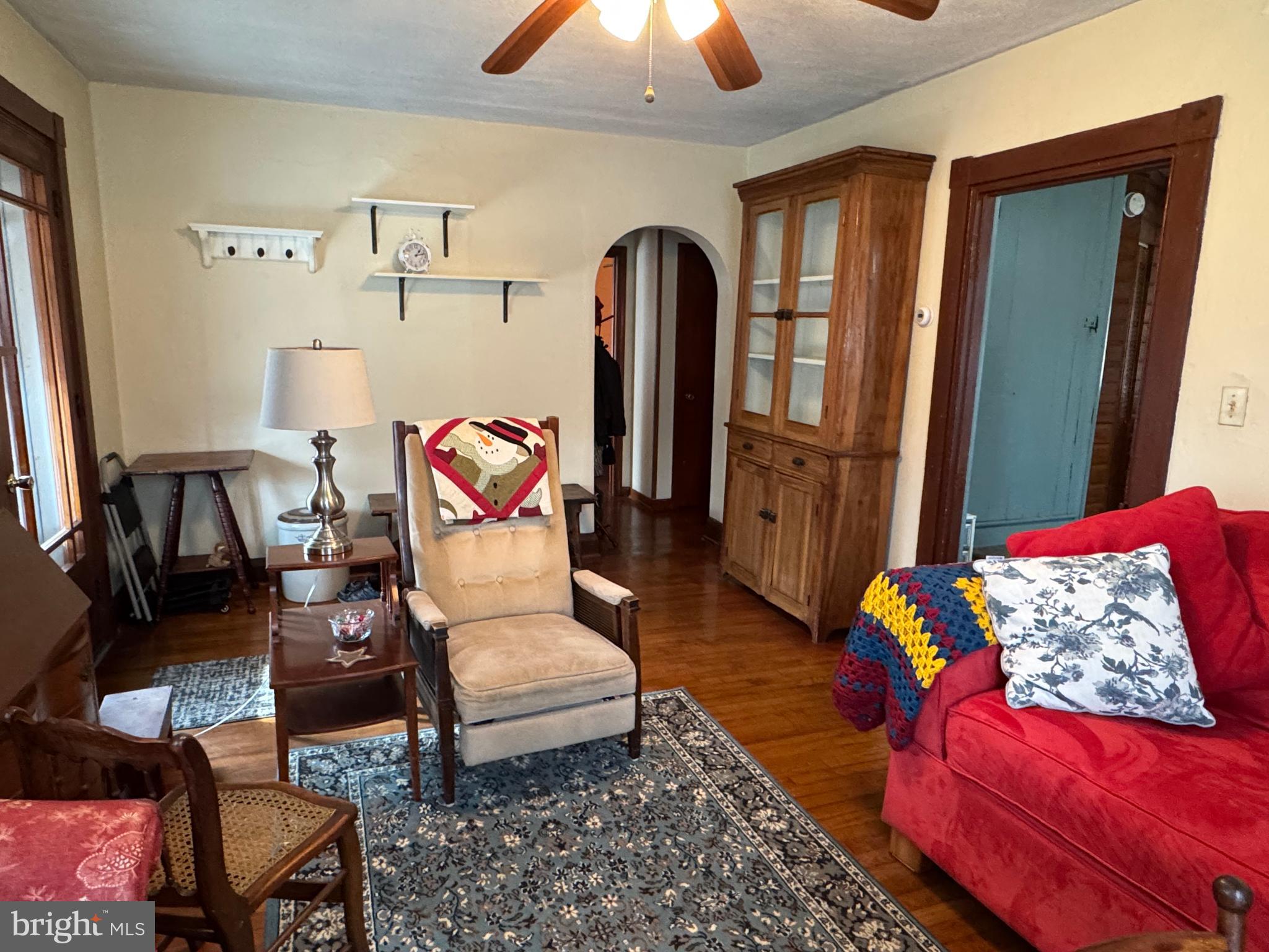 631 McCauley Road Conowingo, MD 21918 - Photo 8 of 32 a living room with furniture rug and wooden floor