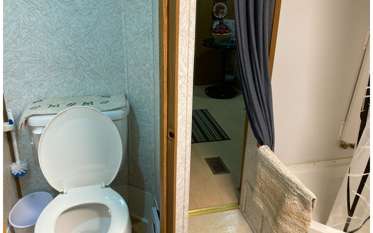 1300 Candy Mountain Road Murphy, NC 28906 - Photo 11 of 27 a bathroom with a toilet and a sink