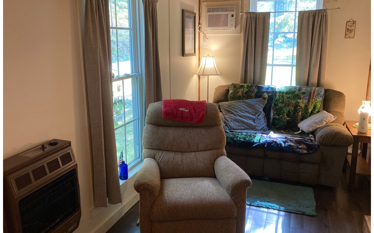 1300 Candy Mountain Road Murphy, NC 28906 - Photo 14 of 27 a living room with furniture and a window