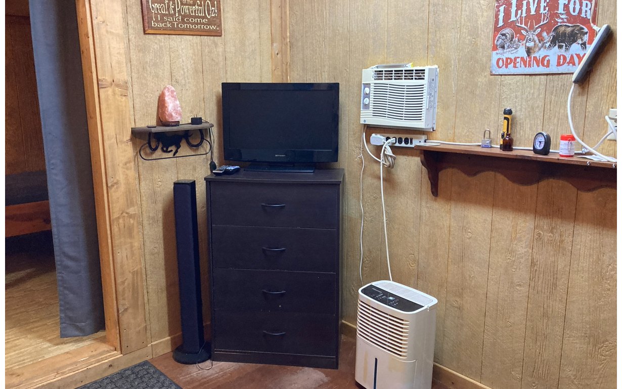 1300 Candy Mountain Road Murphy, NC 28906 - Photo 16 of 27 a view of room with a flat tv screen on dresser and a shower