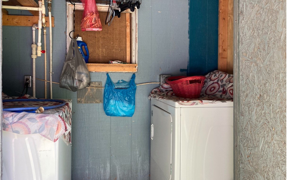 1300 Candy Mountain Road Murphy, NC 28906 - Photo 21 of 27 a utility room with dryer washer and a view of living room