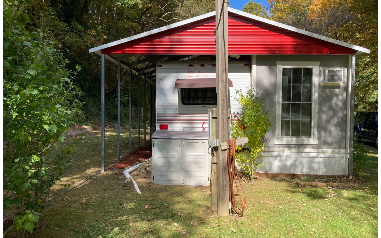1300 Candy Mountain Road Murphy, NC 28906 - Photo 25 of 27 a front view of house with a yard