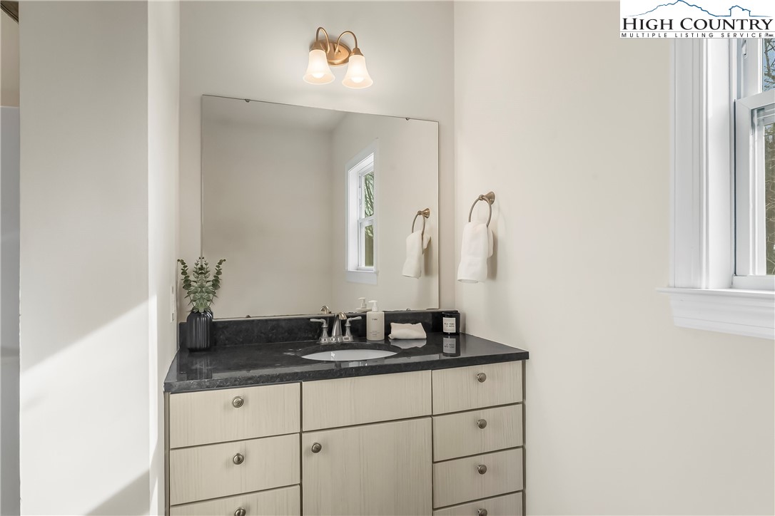 262 Old Bristol Road Boone, NC 28607 - Photo 26 of 38 a bathroom with a sink and a mirror