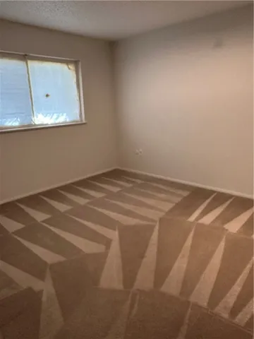 a view of a room with a sink and a window