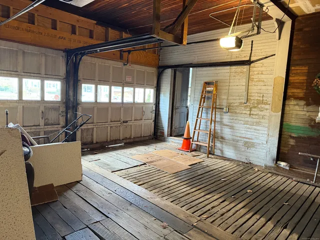 a view of a patio with wooden floor and chair