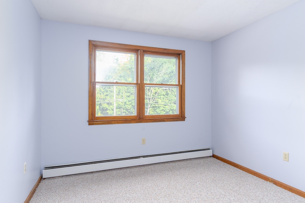 280 South Barre Road Barre, MA 01005 - Photo 11 of 25 an empty room with a window