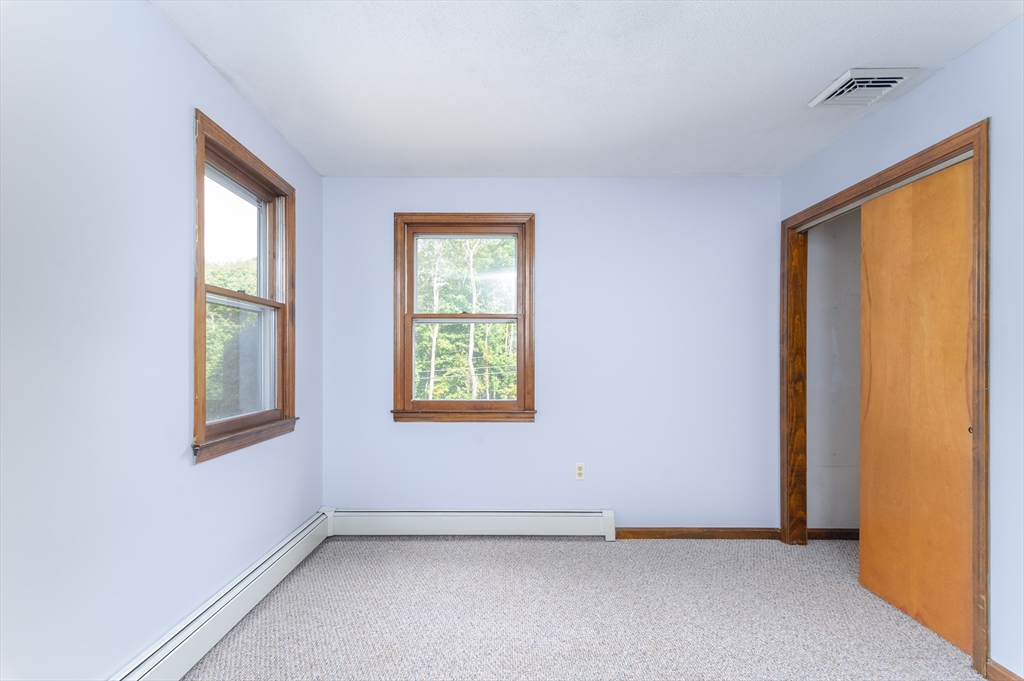 280 South Barre Road Barre, MA 01005 - Photo 12 of 25 an empty room with a window