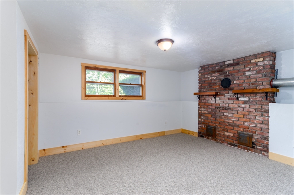 280 South Barre Road Barre, MA 01005 - Photo 18 of 25 a view of an empty room with brick walls