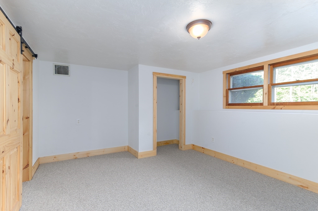 280 South Barre Road Barre, MA 01005 - Photo 20 of 25 a view of an empty room with a window