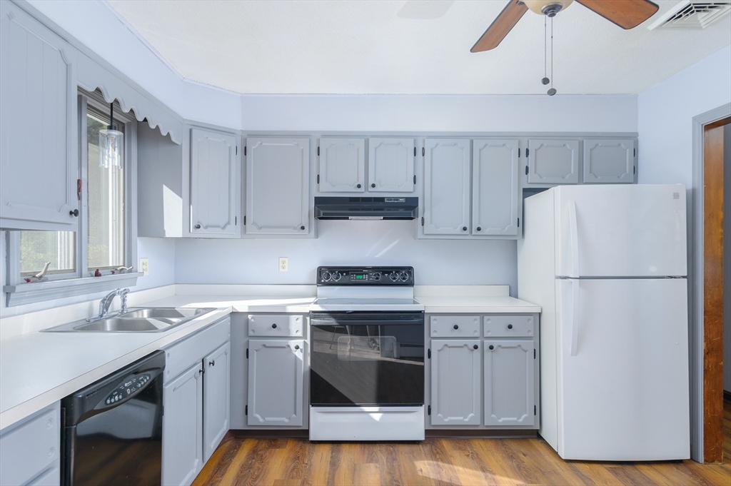280 South Barre Road Barre, MA 01005 - Photo 2 of 25 a kitchen with a white cabinets and white appliances