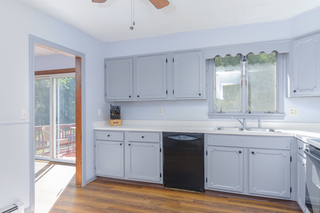280 South Barre Road Barre, MA 01005 - Photo 3 of 25 a kitchen with a sink cabinets and wooden floor