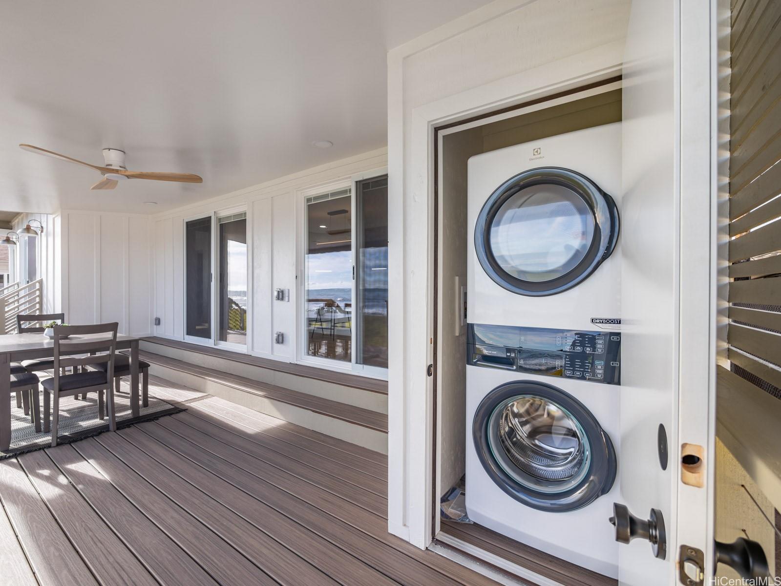 91-481 Ewa Beach Road, Unit C Ewa Beach, HI 96706 - Photo 24 of 25 a view of a house with washer and dryer