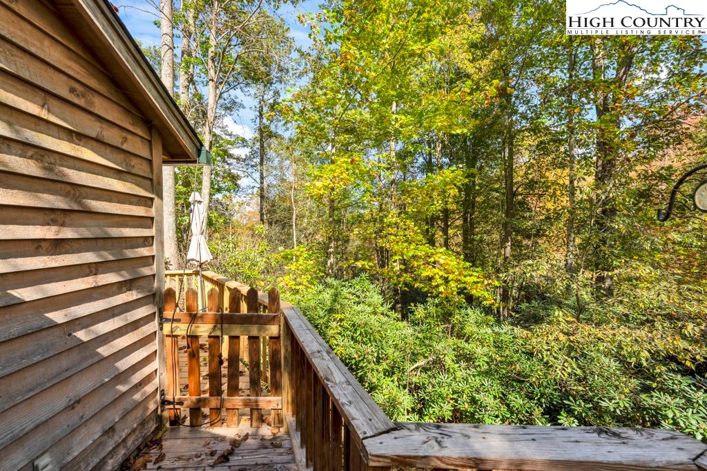 180 Wild Blackberry Hill Road Boone, NC 28607 - Photo 26 of 30 a view of balcony with wooden floor