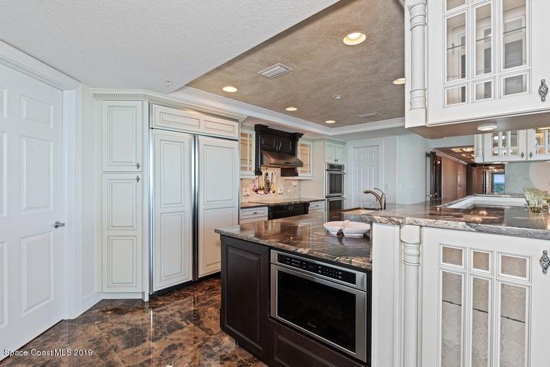 1323 Florida A1A, Unit 601 Satellite Beach, FL 32937 - Photo 12 of 45 27_1323HighwayA1A_601_177005_Kitchen_Fle