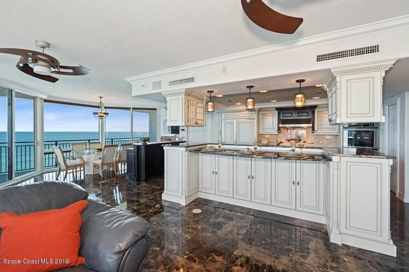 1323 Florida A1A, Unit 601 Satellite Beach, FL 32937 - Photo 15 of 45 31_1323HighwayA1A_601_92_KitchenDiningRo