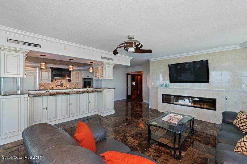 1323 Florida A1A, Unit 601 Satellite Beach, FL 32937 - Photo 22 of 45 38_1323HighwayA1A_601_94001_FamilyRoomKi