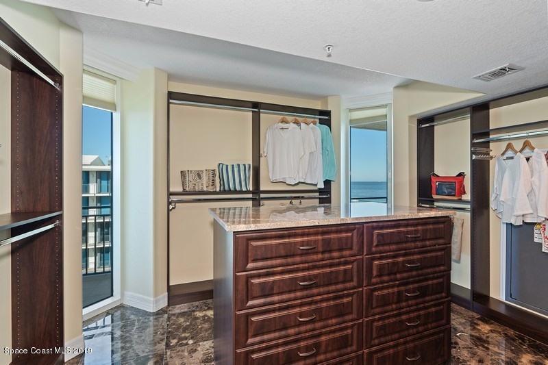 1323 Florida A1A, Unit 601 Satellite Beach, FL 32937 - Photo 24 of 45 39_1323HighwayA1A_601_45_MasterBedroomCl