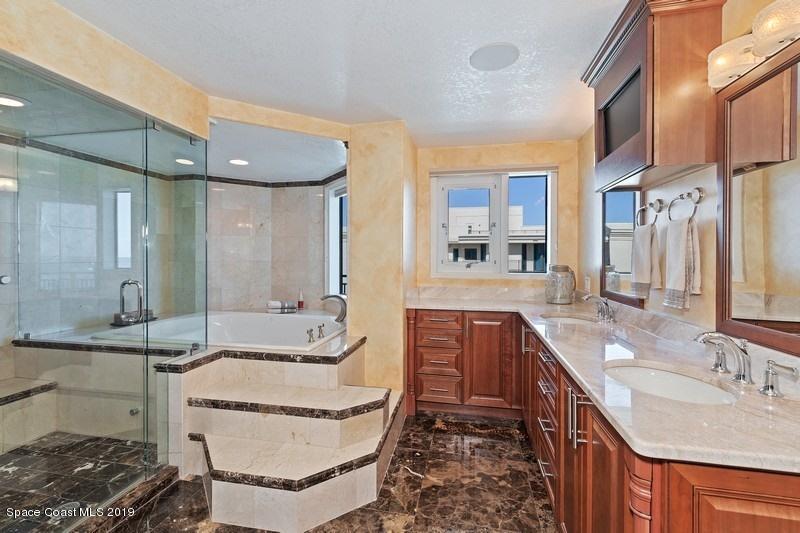 1323 Florida A1A, Unit 601 Satellite Beach, FL 32937 - Photo 25 of 45 40_1323HighwayA1A_601_13_MasterBathroom_