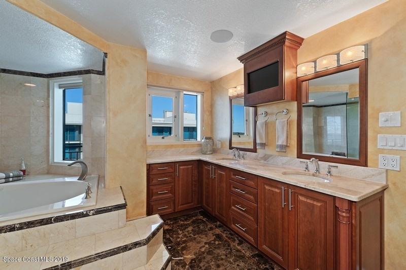 1323 Florida A1A, Unit 601 Satellite Beach, FL 32937 - Photo 27 of 45 42_1323HighwayA1A_601_168_MasterBathroom