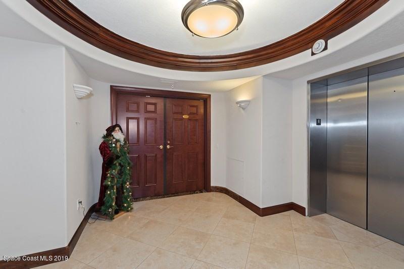 1323 Florida A1A, Unit 601 Satellite Beach, FL 32937 - Photo 5 of 45 21_1323HighwayA1A_601_301_Entrance_FlexM