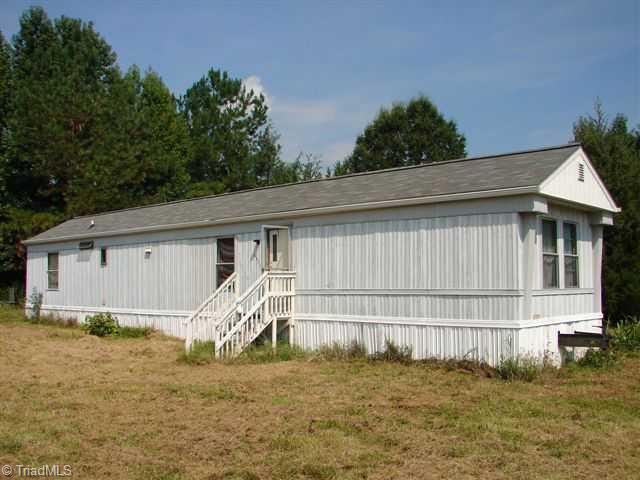 6818 Brooksdale Road Staley, NC 27355 - Photo 1 of 2 Exterior Front.
