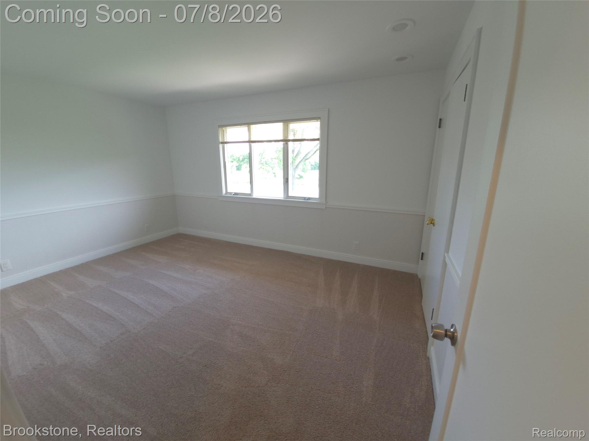 4140 South Henderson Road Davison, MI 48423 - Photo 55 of 98 Neutral tone wall paint with decorative chair rail molding
