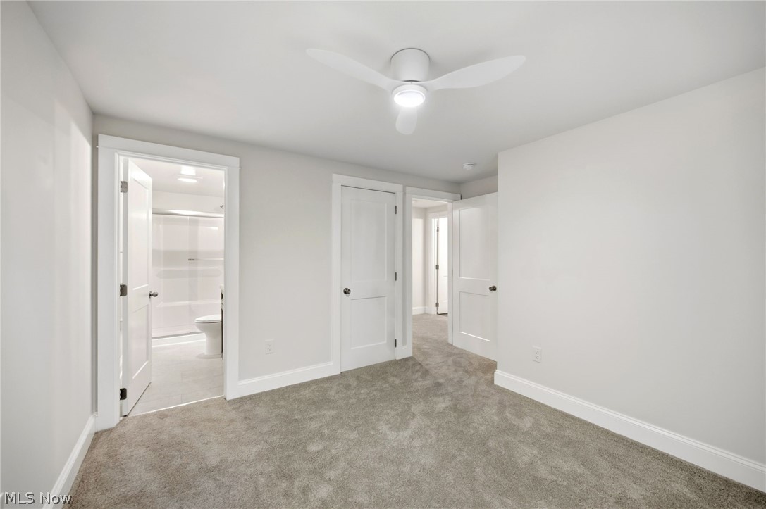 272 Miles Road Chagrin Falls, OH 44022 - Photo 19 of 36 Spacious owner suite featuring neutral carpeting, and a ceiling fan with integrated lighting