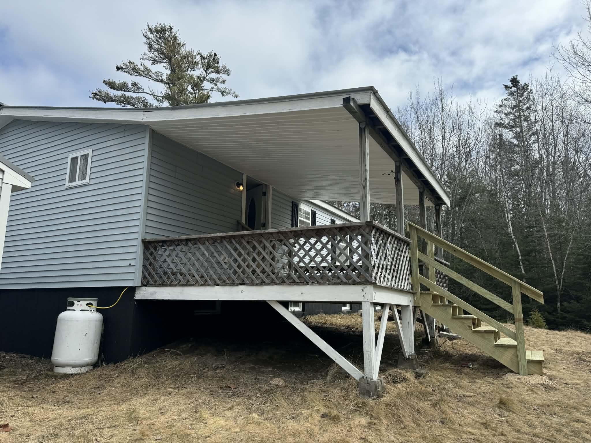141 Cross Road Hancock, ME 04640 - Photo 7 of 46 side view deck