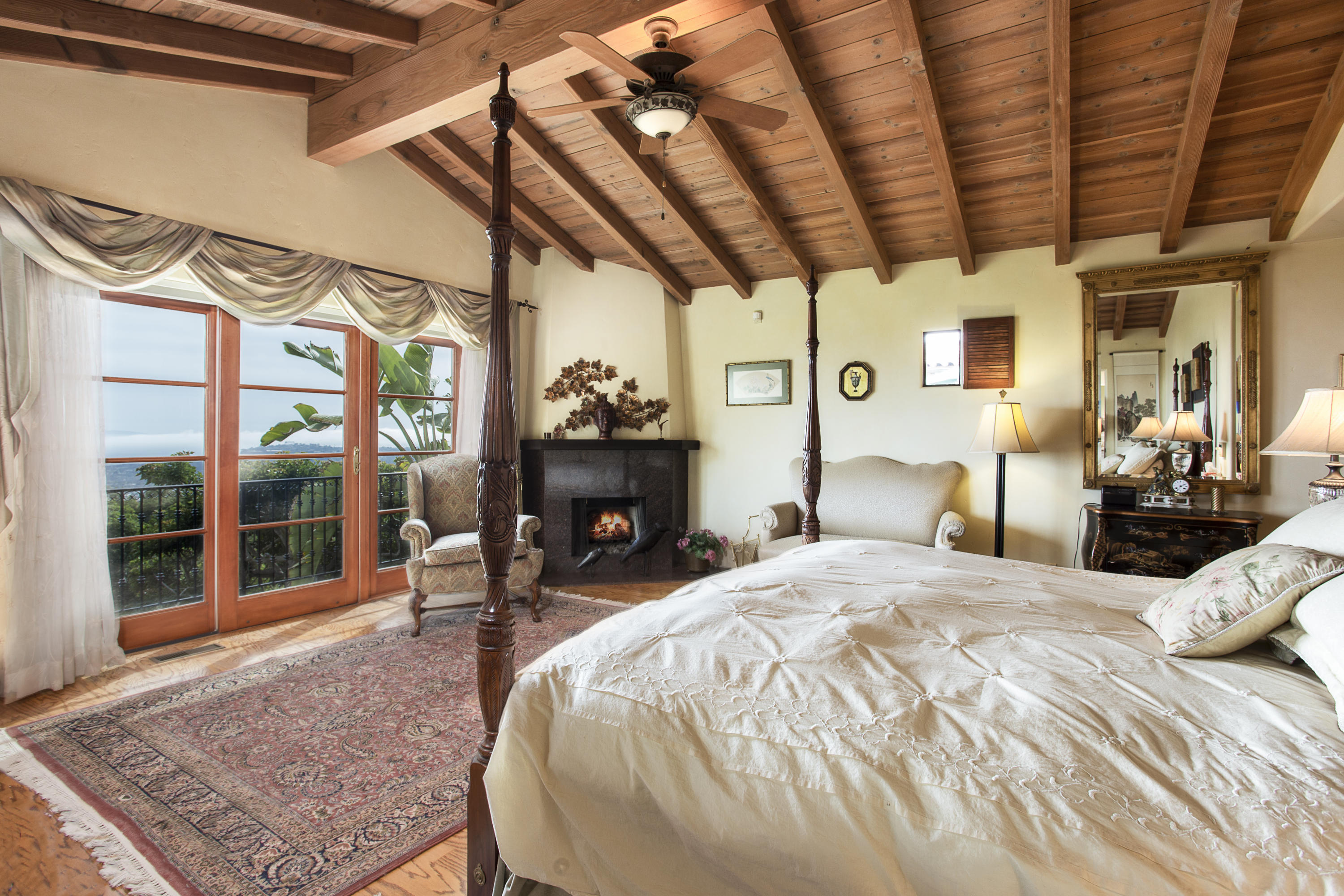 1214 High Ridge Lane Santa Barbara, CA 93103 - Photo 11 of 22 a bed sitting in a spacious bedroom next to a window