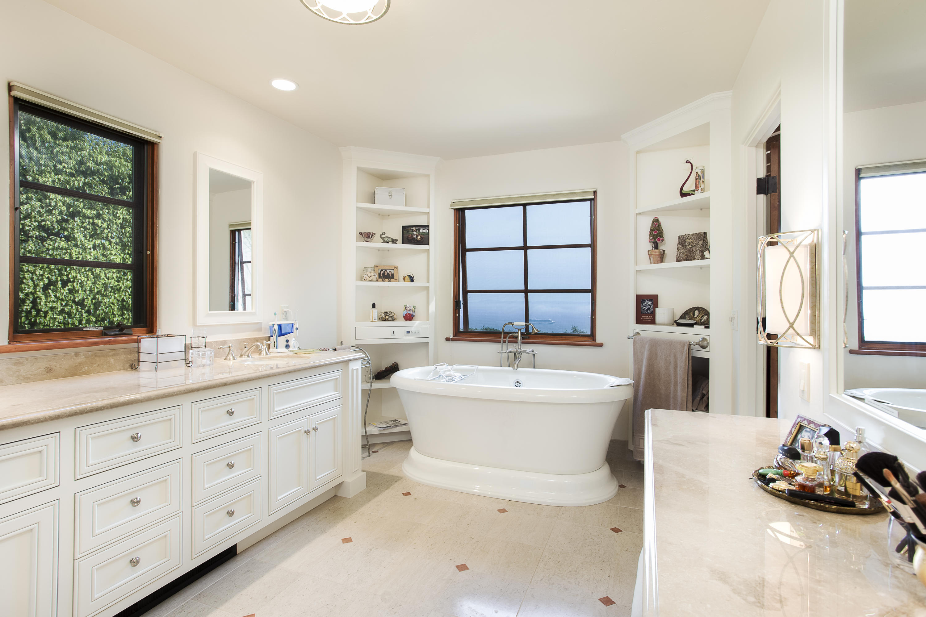 1214 High Ridge Lane Santa Barbara, CA 93103 - Photo 12 of 22 a spacious bathroom with double vanity a window a double vanity and a bathtub