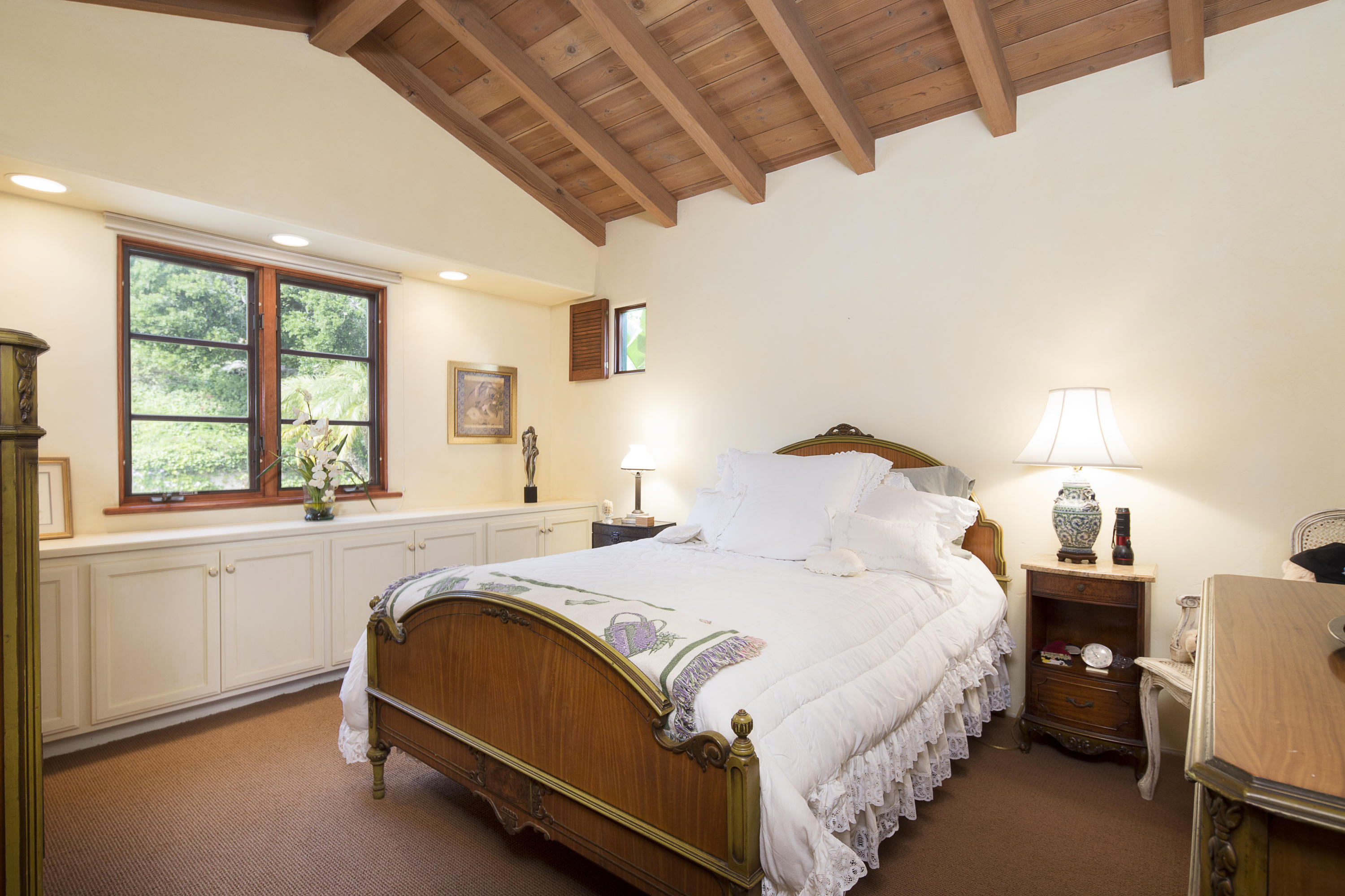 1214 High Ridge Lane Santa Barbara, CA 93103 - Photo 14 of 22 a spacious bedroom with a bed and a large window with outer view