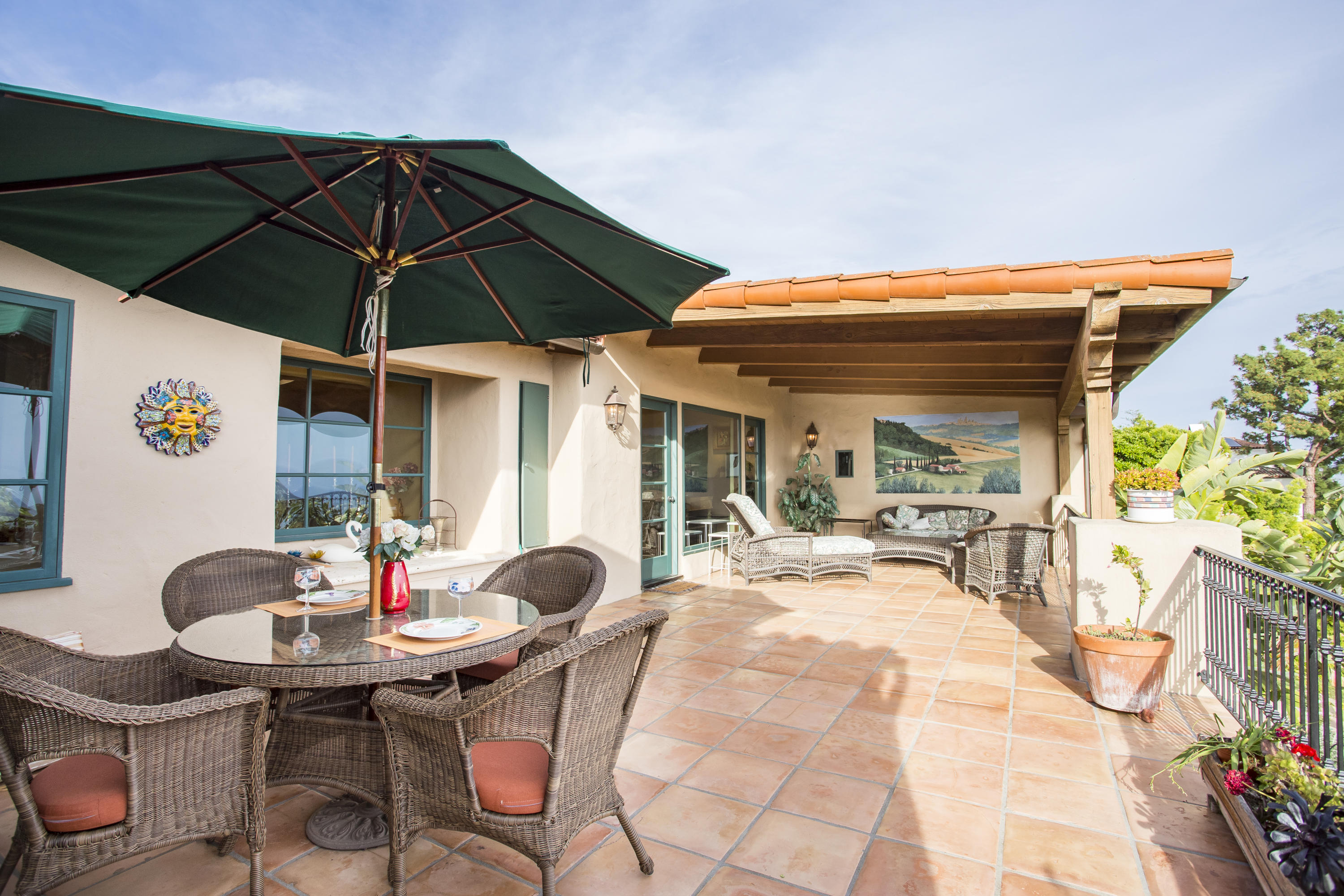 1214 High Ridge Lane Santa Barbara, CA 93103 - Photo 17 of 22 a view of a dining table and chairs in the patio