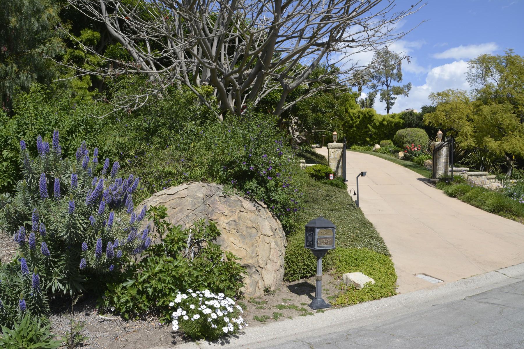 1214 High Ridge Lane Santa Barbara, CA 93103 - Photo 19 of 22 a view of a garden with a fountain