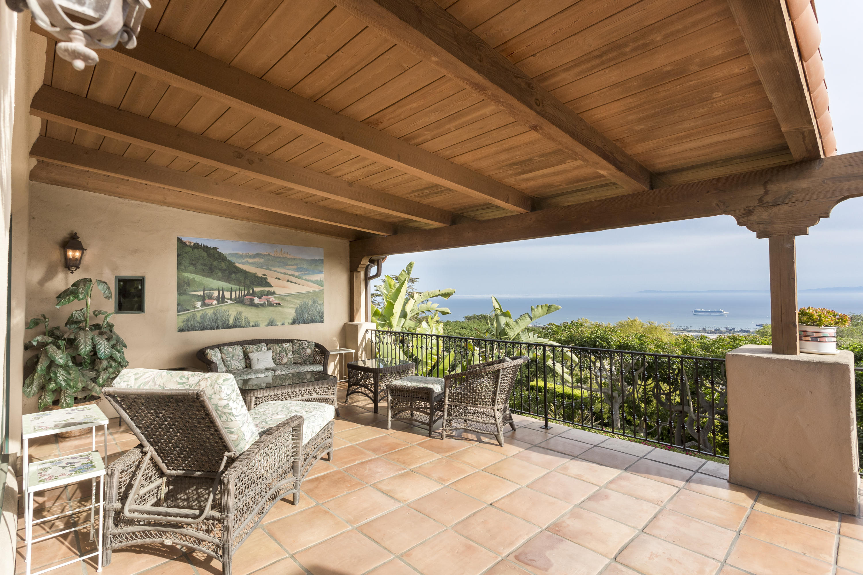1214 High Ridge Lane Santa Barbara, CA 93103 - Photo 3 of 22 a view of a patio with a table chairs and a couple of potted plants