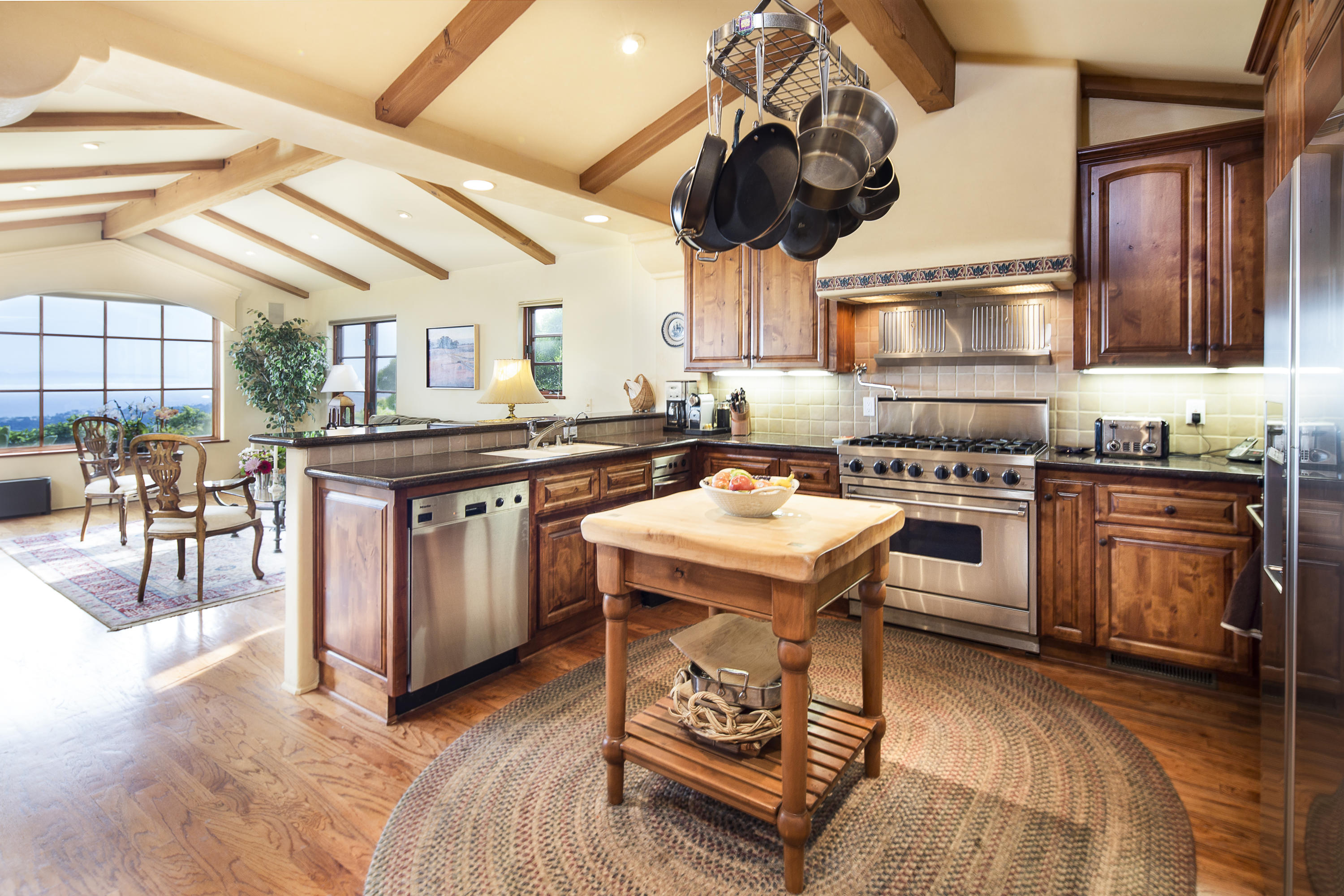 1214 High Ridge Lane Santa Barbara, CA 93103 - Photo 5 of 22 a kitchen with a stove and a wooden floors