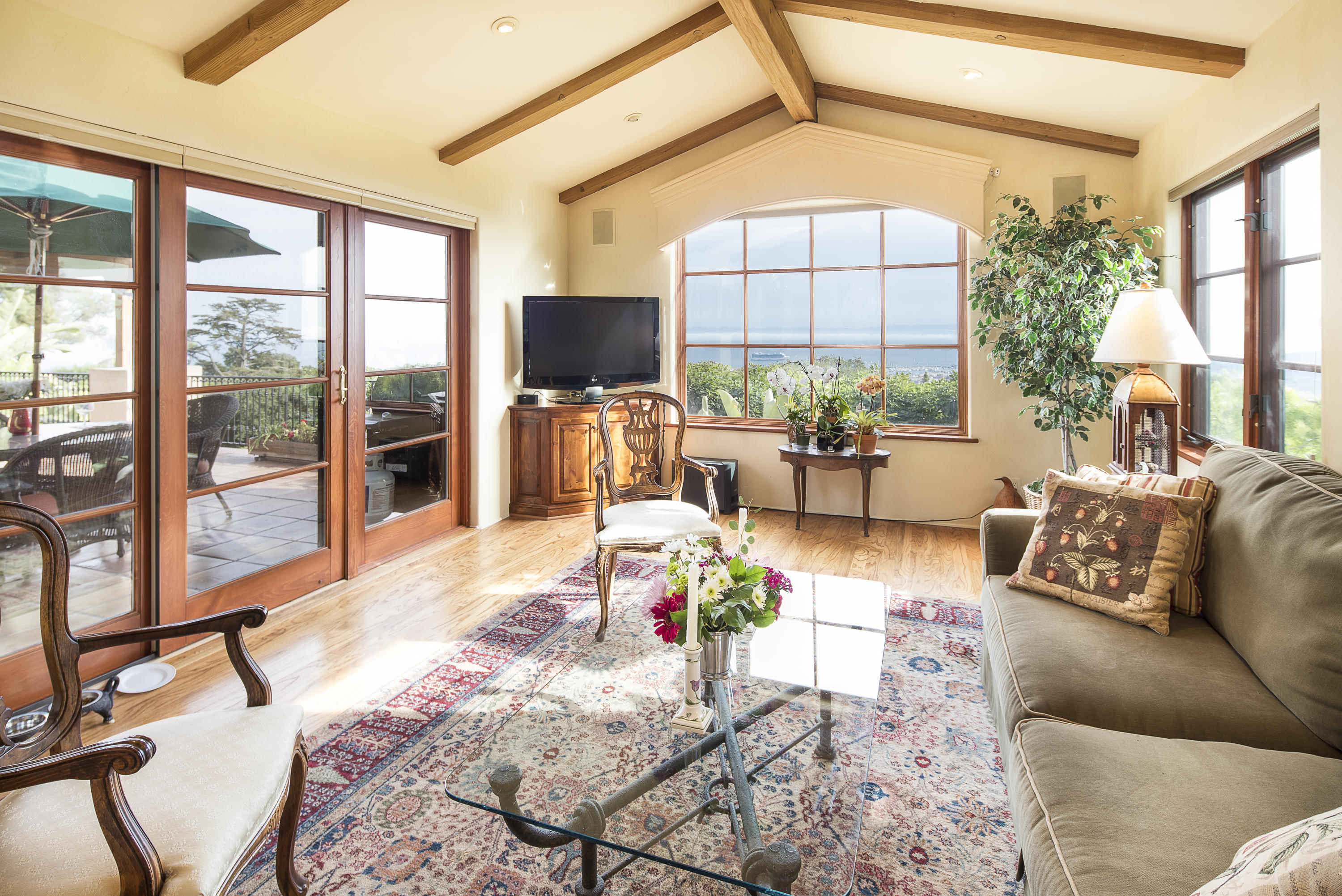 1214 High Ridge Lane Santa Barbara, CA 93103 - Photo 6 of 22 a living room with fireplace furniture and a large window