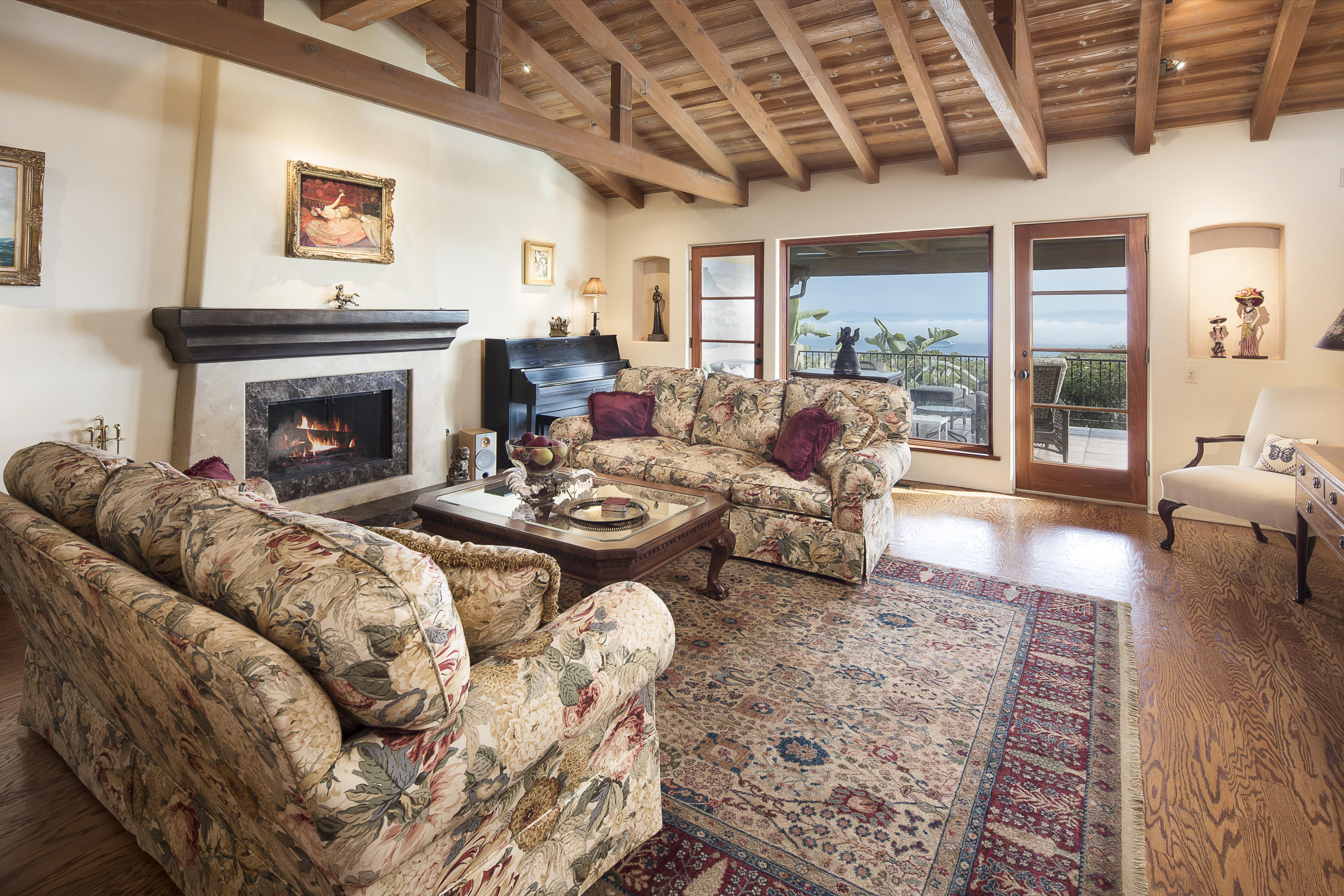 1214 High Ridge Lane Santa Barbara, CA 93103 - Photo 8 of 22 a living room with furniture and a fireplace