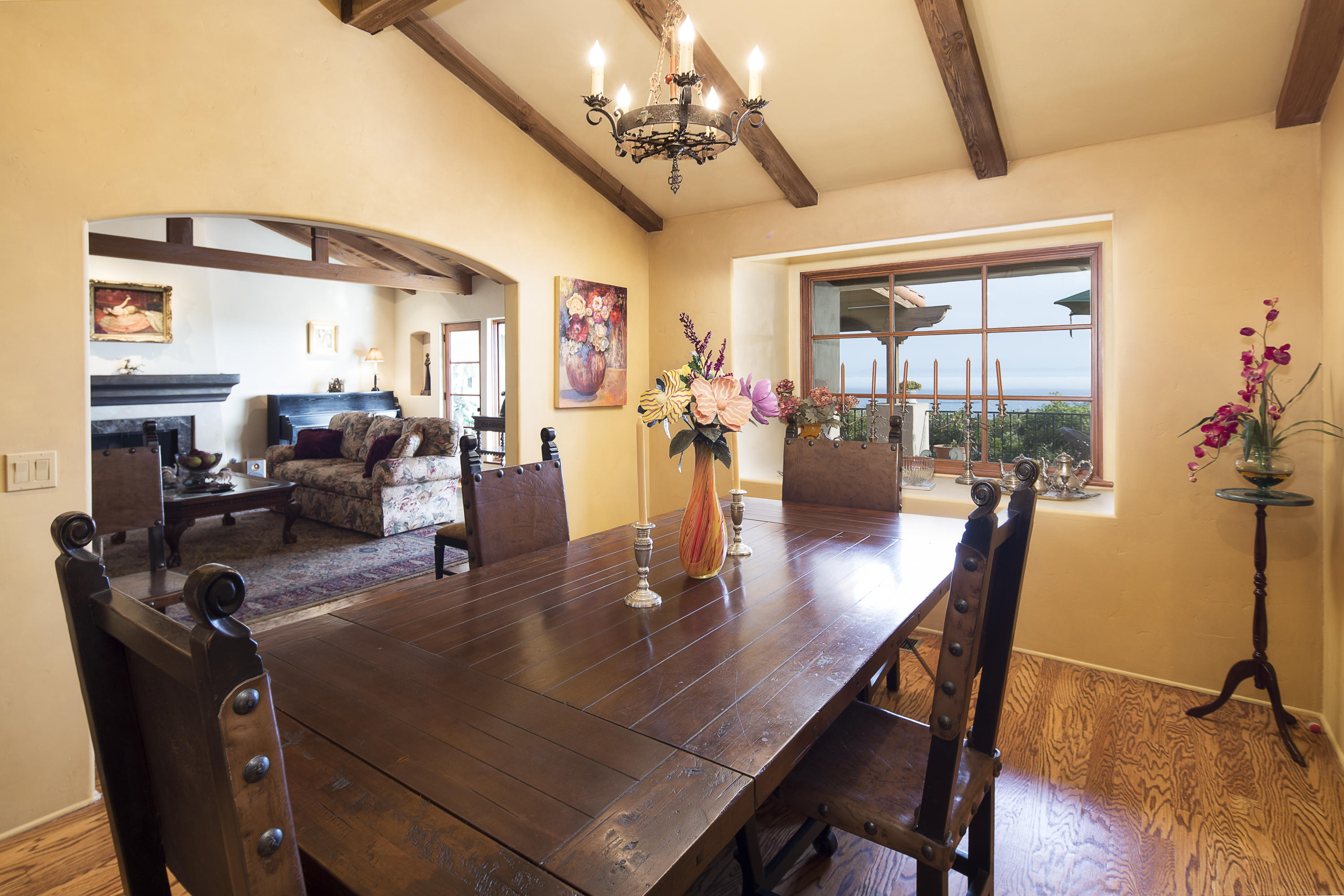 1214 High Ridge Lane Santa Barbara, CA 93103 - Photo 10 of 22 a dining room with furniture a chandelier and wooden floor
