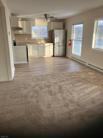 a view of a kitchen with a sink