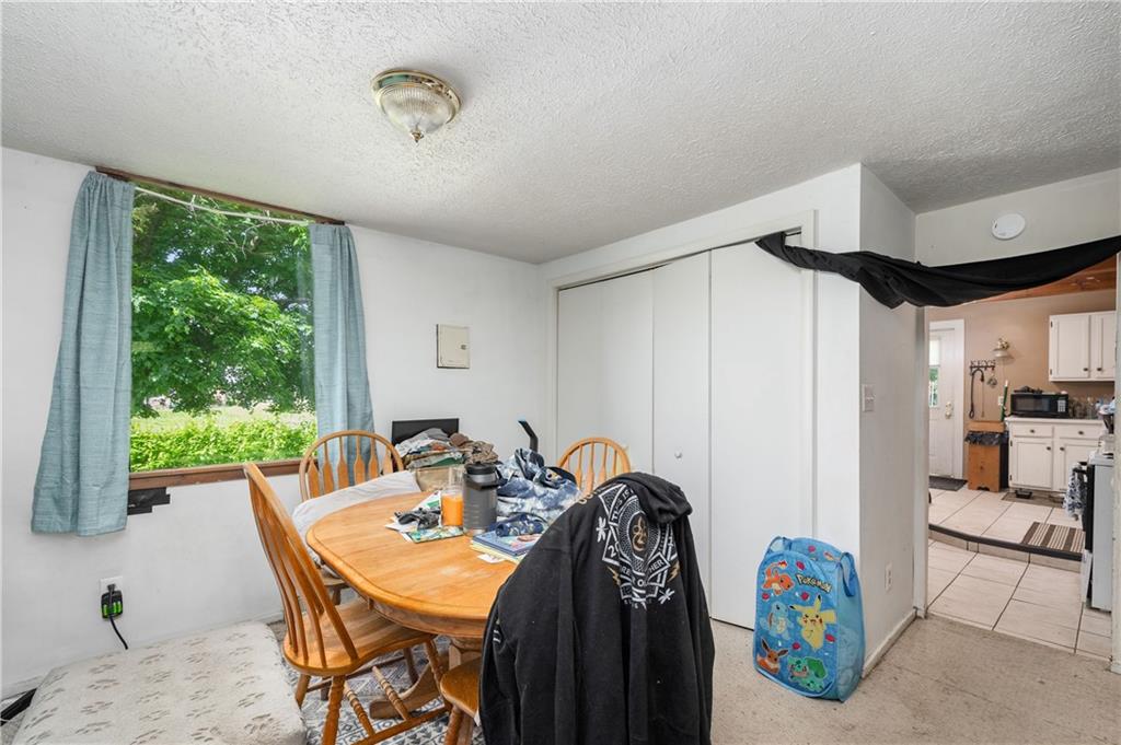 934 West Ridge Avenue Sharpsville, PA 16150 - Photo 32 of 38 a view of a dining room with furniture window and outside view