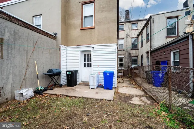 a view of a house with backyard of the house