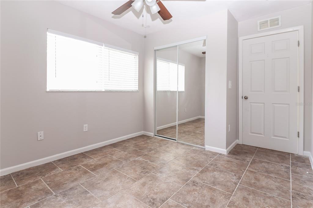8104 Juarez Drive Port Richey, FL 34668 - Photo 13 of 15 a view of an empty room with a window