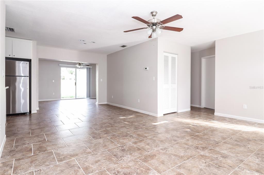 8104 Juarez Drive Port Richey, FL 34668 - Photo 3 of 15 a view of a livingroom with a ceiling fan and window